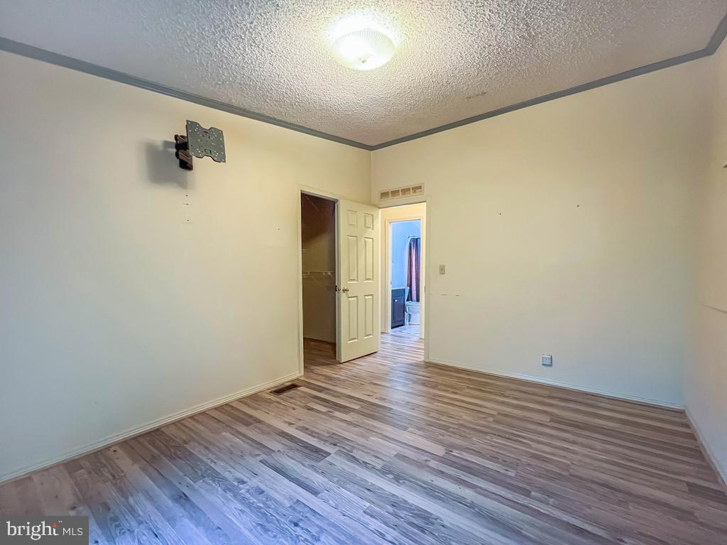 13 Clovedale Way Souderton, PA 18964 - Photo 28 of 33 a view of an empty room with wooden floor