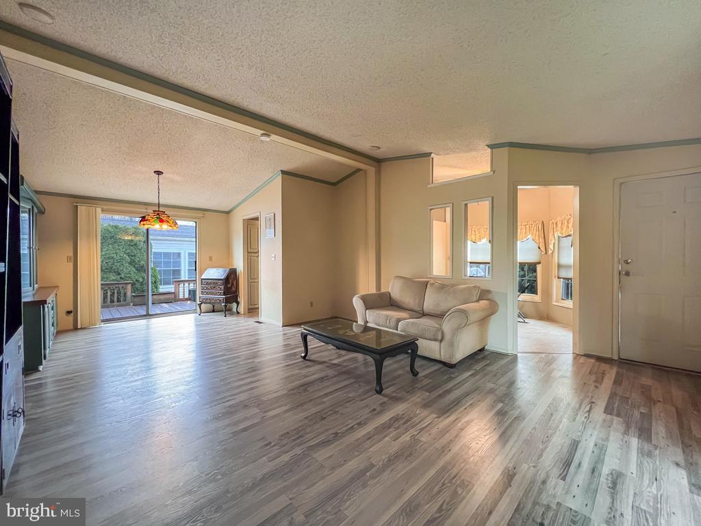 13 Clovedale Way Souderton, PA 18964 - Photo 7 of 33 a living room with furniture and a wooden floor