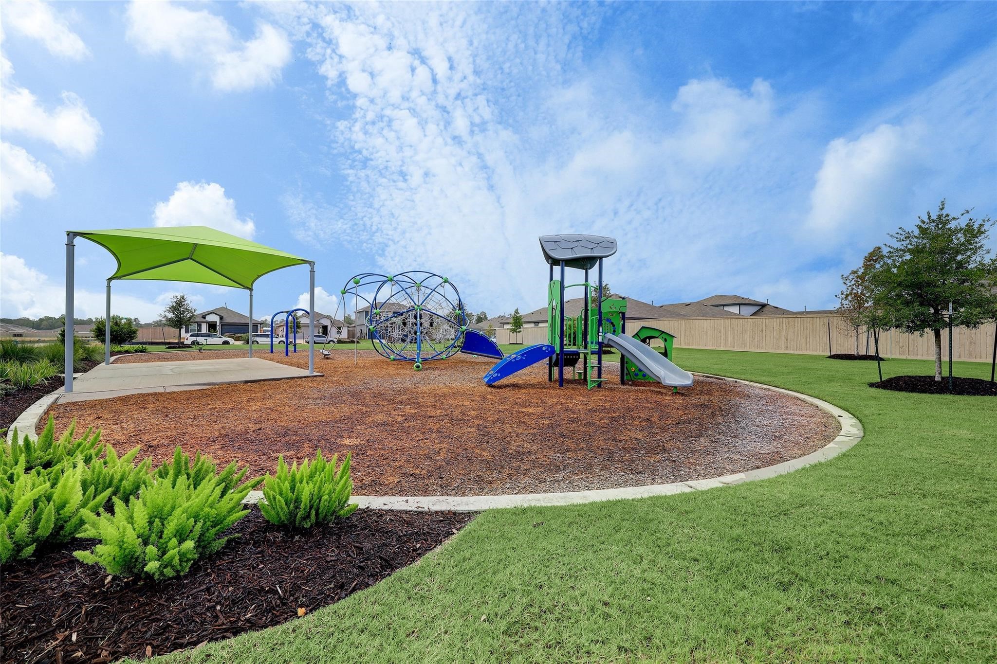 14601 Ivy Floral Way Splendora, TX 77372 - Photo 19 of 23 a childrens park with lots of swings and slides