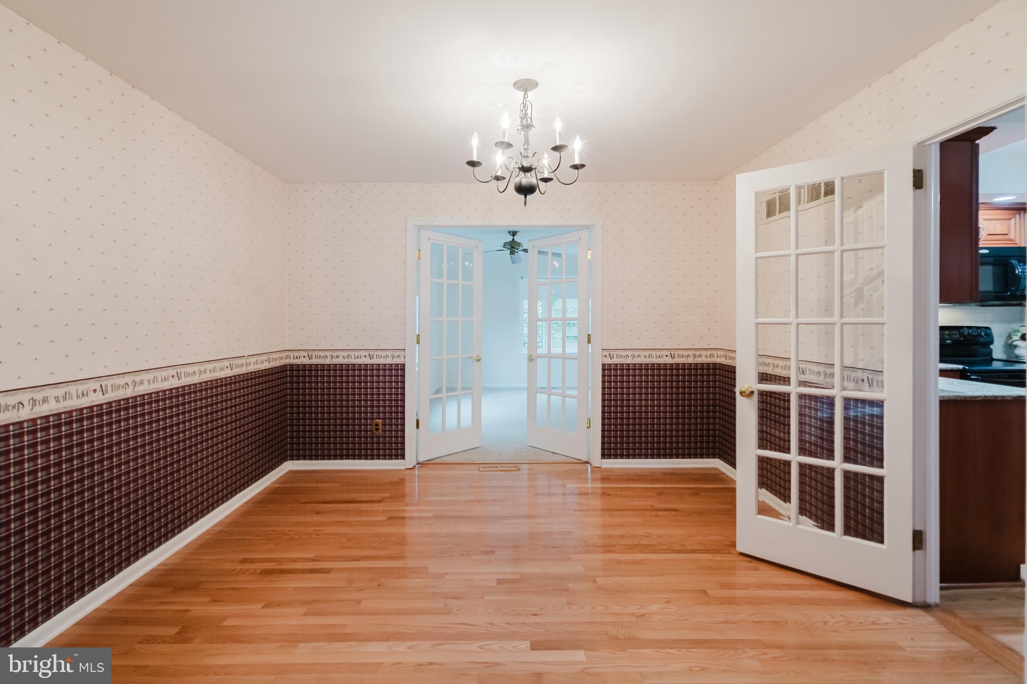 305 Stamford Drive Newark, DE 19711 - Photo 13 of 51 Formal dining room with french doors to bonus room
