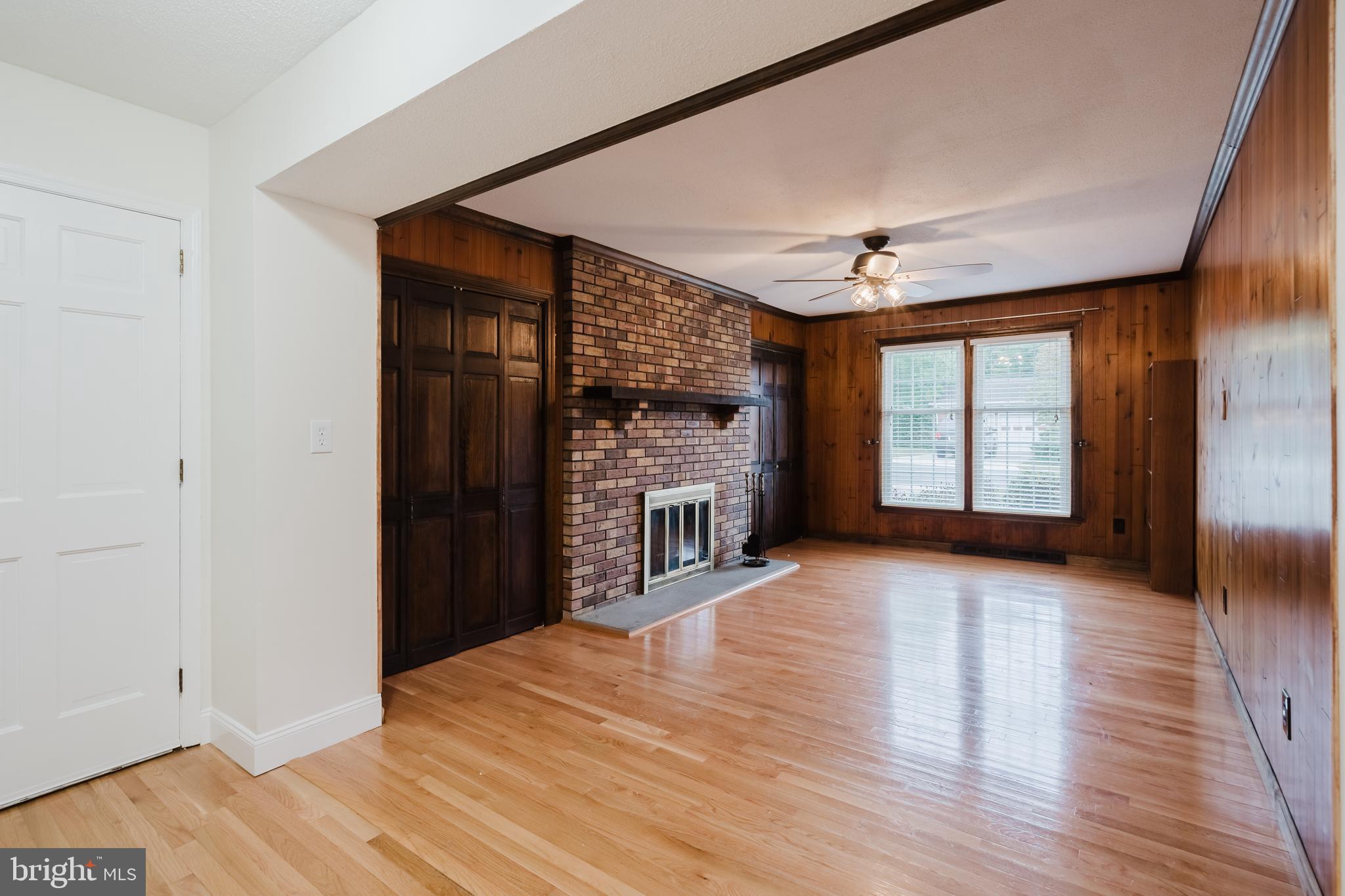 305 Stamford Drive Newark, DE 19711 - Photo 18 of 51 Additional den area with brick fireplace.