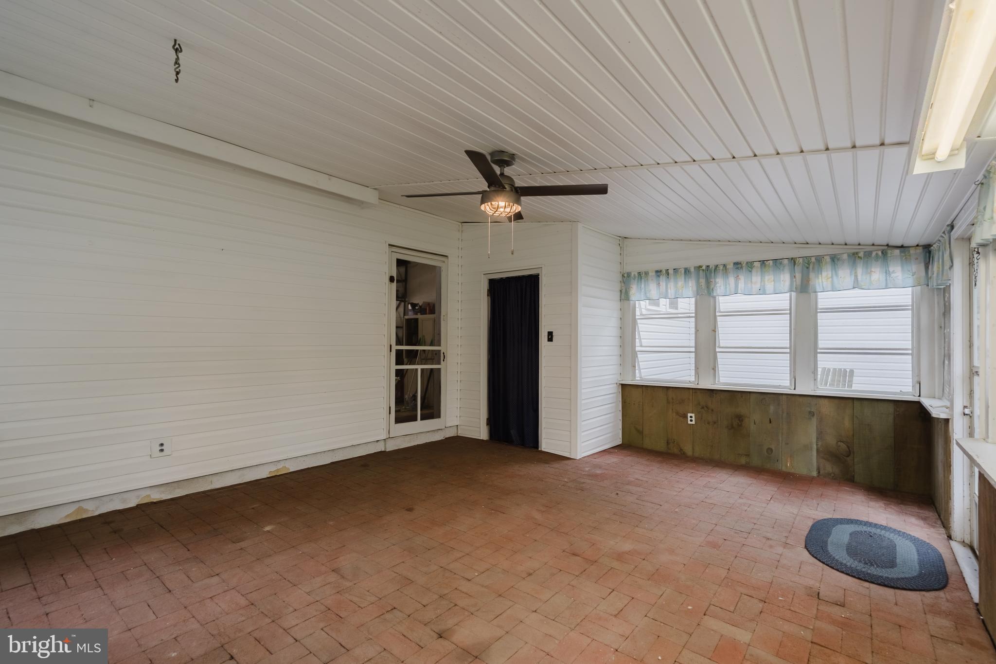 305 Stamford Drive Newark, DE 19711 - Photo 24 of 51 Enclosed porch with additional storage.