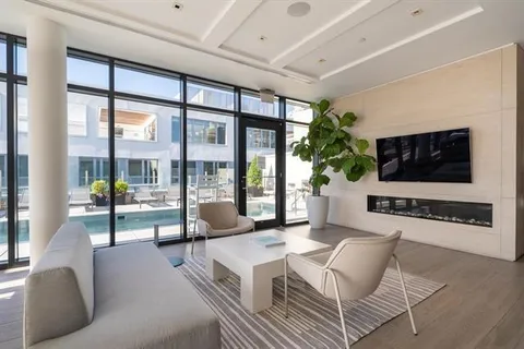 a view of a workspace with furniture