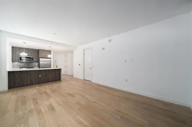 a view of a kitchen with a sink