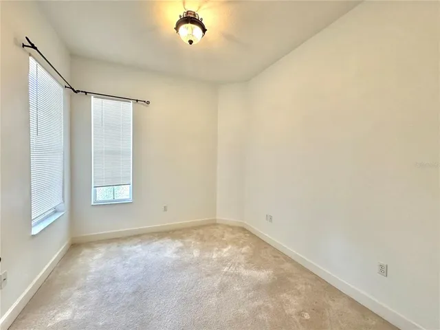 a view of a livingroom with a ceiling fan