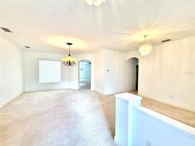 a view of a storage & utility room with a window