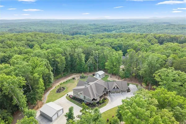an aerial view of residential house with outdoor space