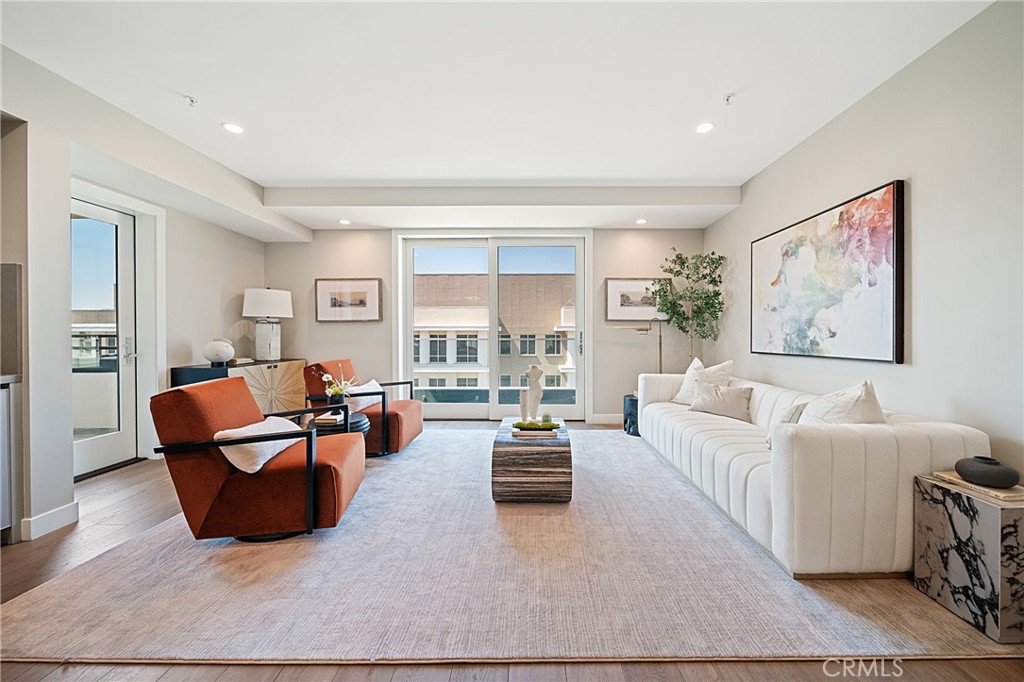 39 South Los Robles Avenue, Unit 6010 Pasadena, CA 91101 - Photo 11 of 38 a living room with furniture and a large window