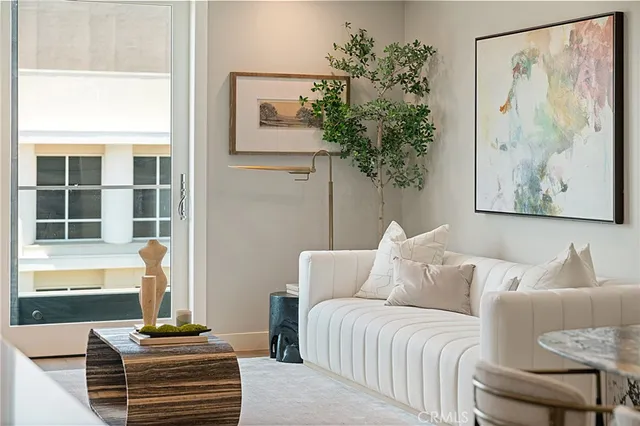 a living room with furniture and a couch