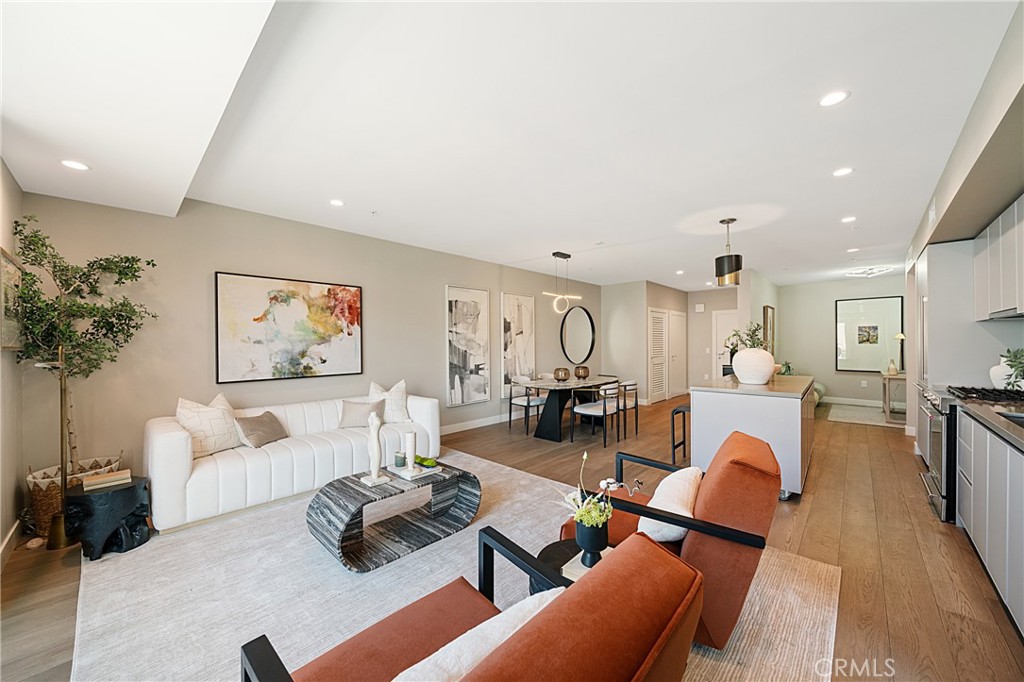39 South Los Robles Avenue, Unit 6010 Pasadena, CA 91101 - Photo 18 of 38 a living room with furniture and a couch