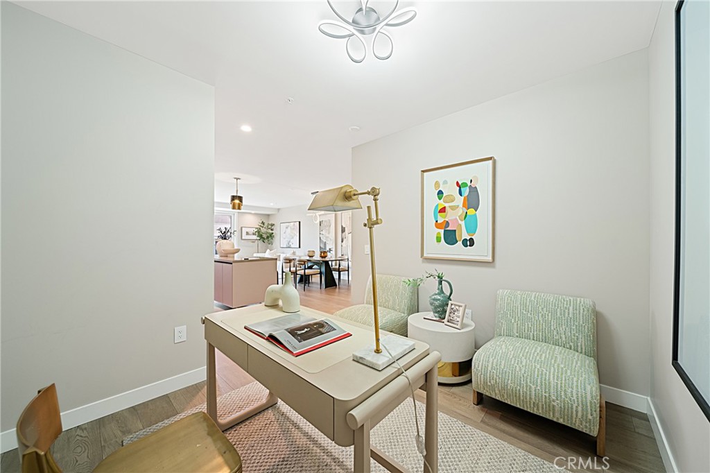 39 South Los Robles Avenue, Unit 6010 Pasadena, CA 91101 - Photo 20 of 38 a living room with furniture and a table