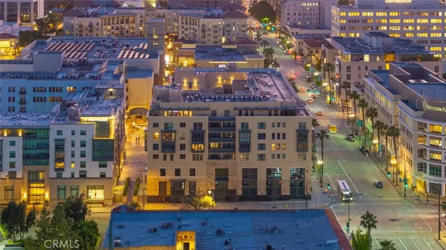 a front view of a building with glass windows and door