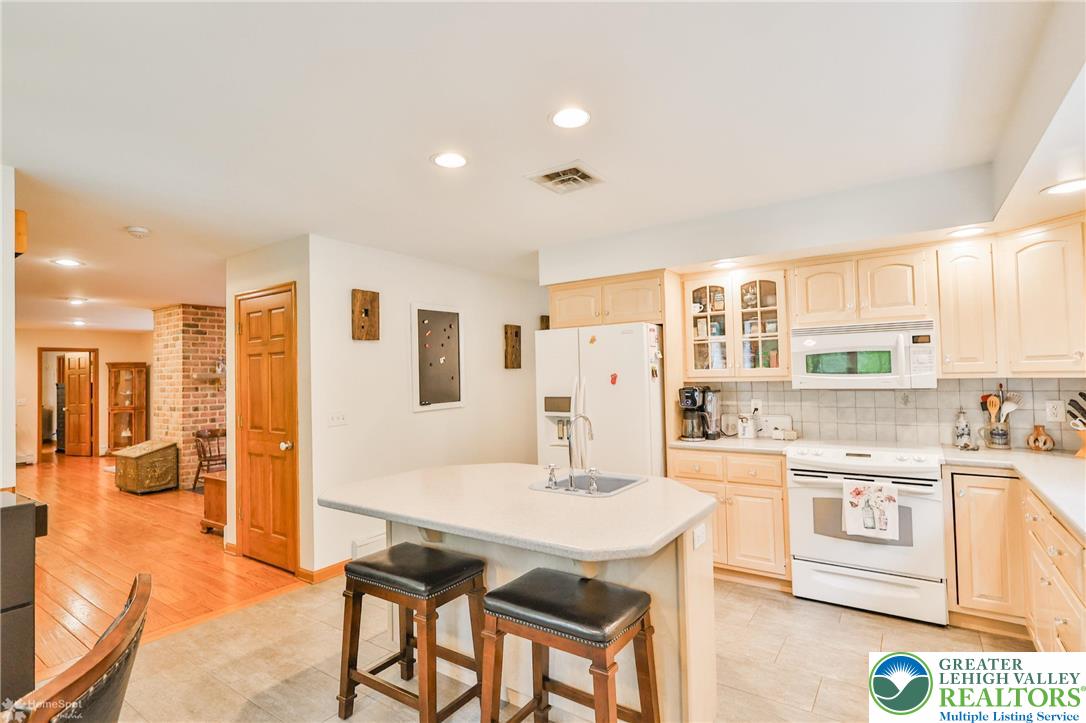 3745 Orefield Road Allentown, PA 18104 - Photo 20 of 76 Kitchen with center island w/sink