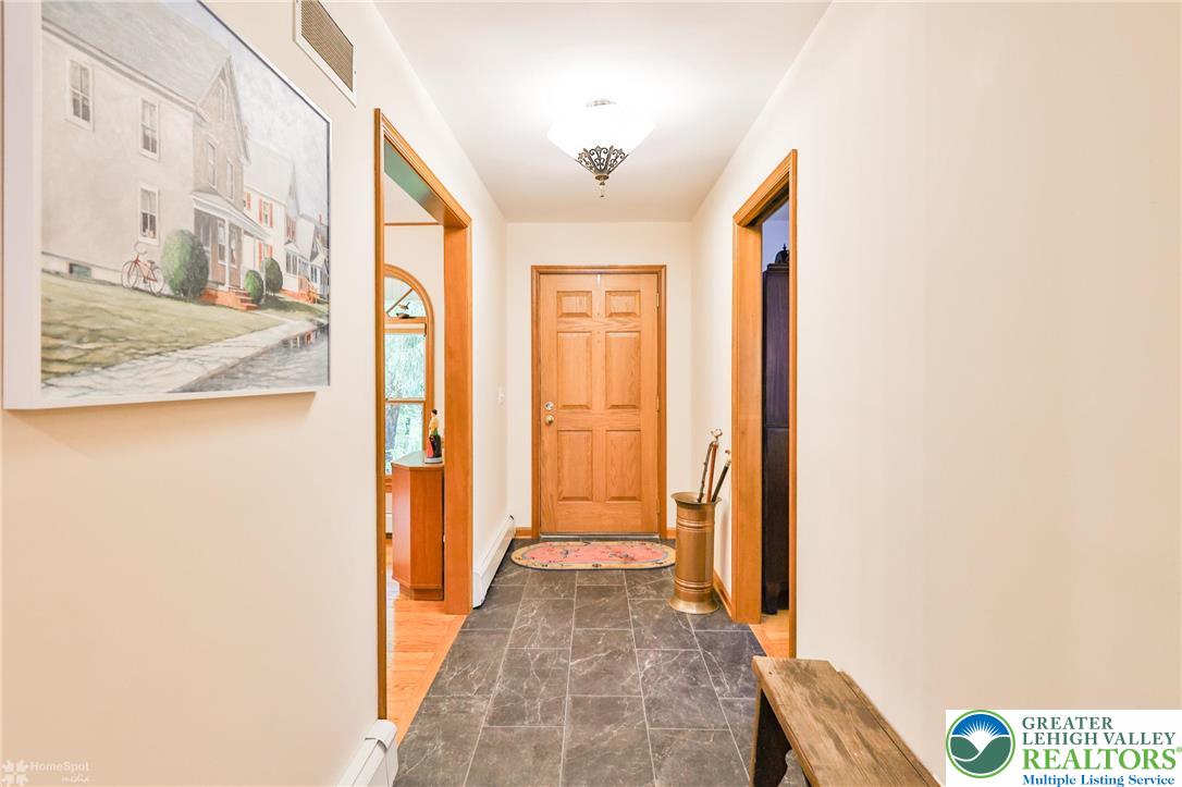 3745 Orefield Road Allentown, PA 18104 - Photo 32 of 76 Long foyer hall w/new tile flooring