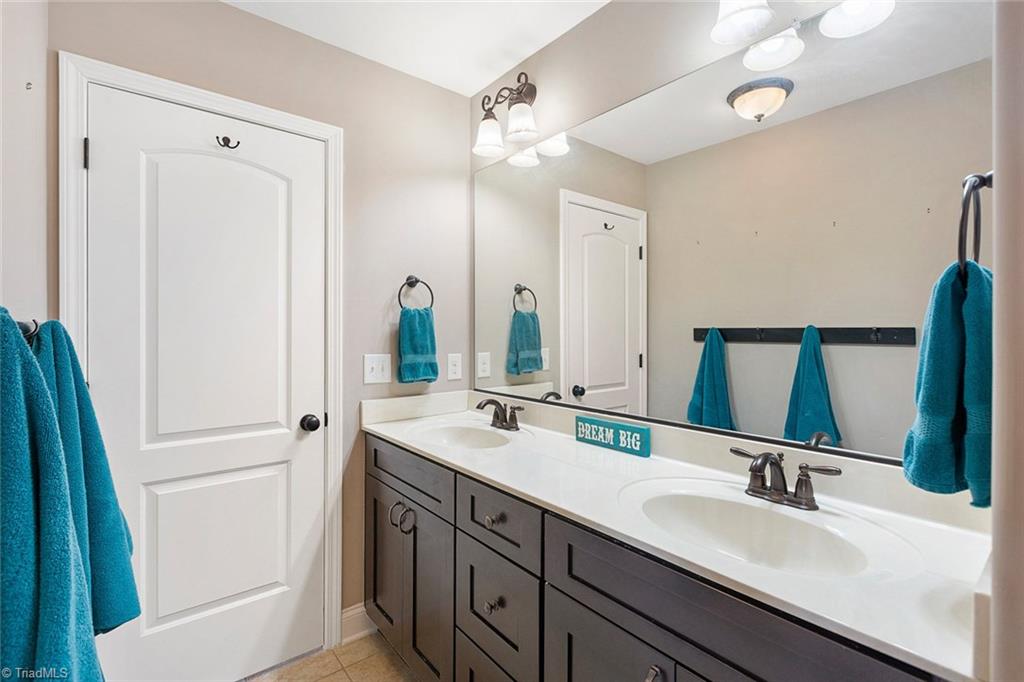 7458 Princess Ann Court Rural Hall, NC 27045 - Photo 23 of 30 Double vanity in spare full bathroom upstairs