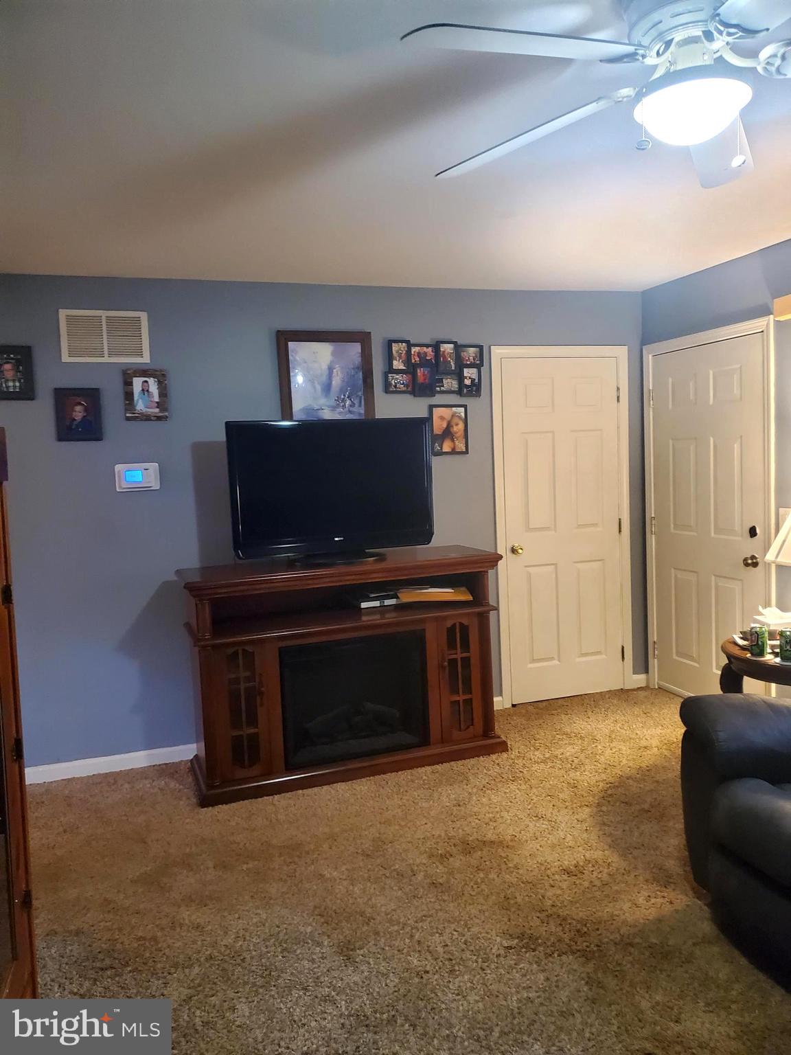 86 Whitetail Lane Magnolia, DE 19962 - Photo 3 of 18 a living room with furniture and a flat screen tv