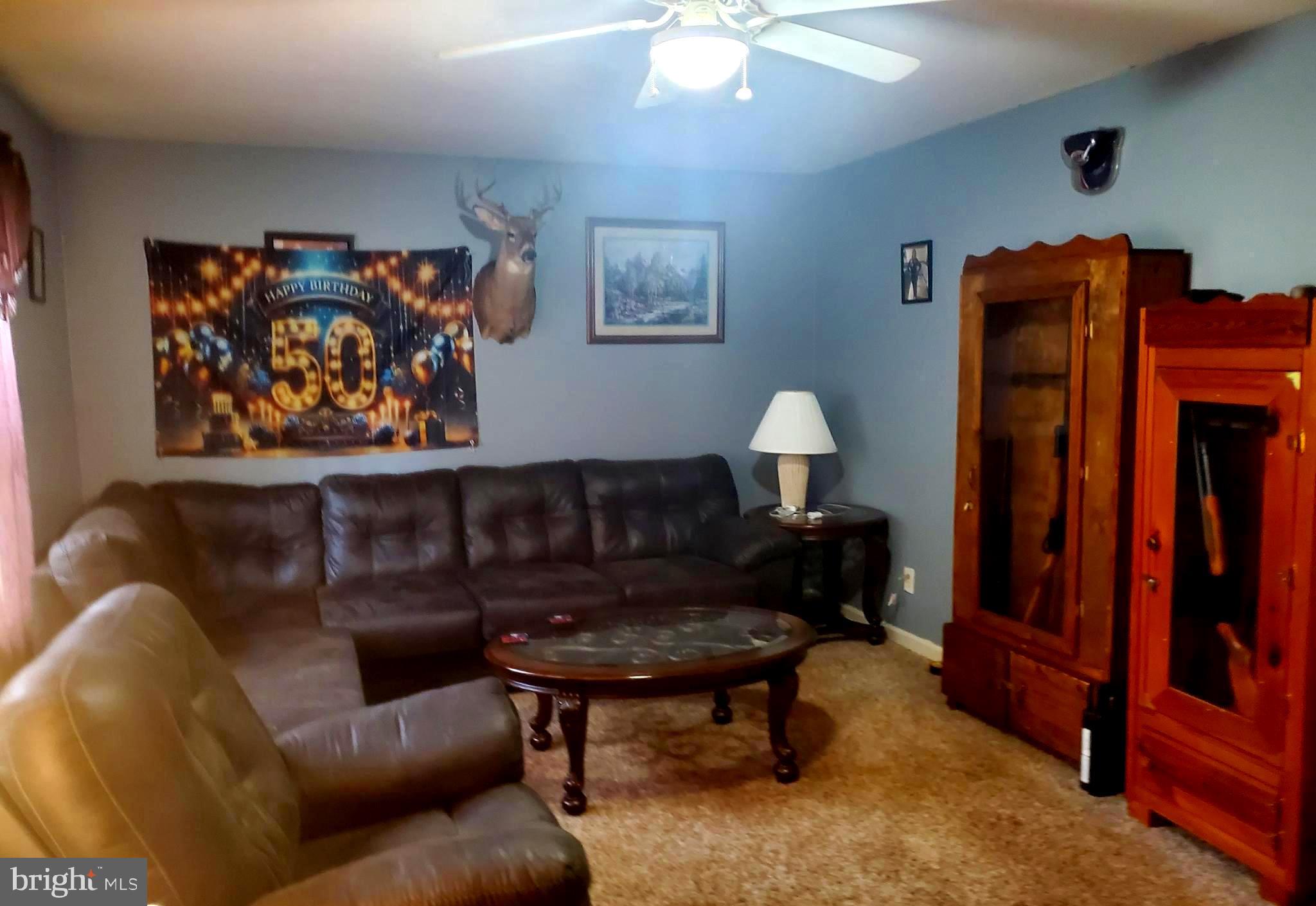 86 Whitetail Lane Magnolia, DE 19962 - Photo 4 of 18 a living room with furniture and a lamp