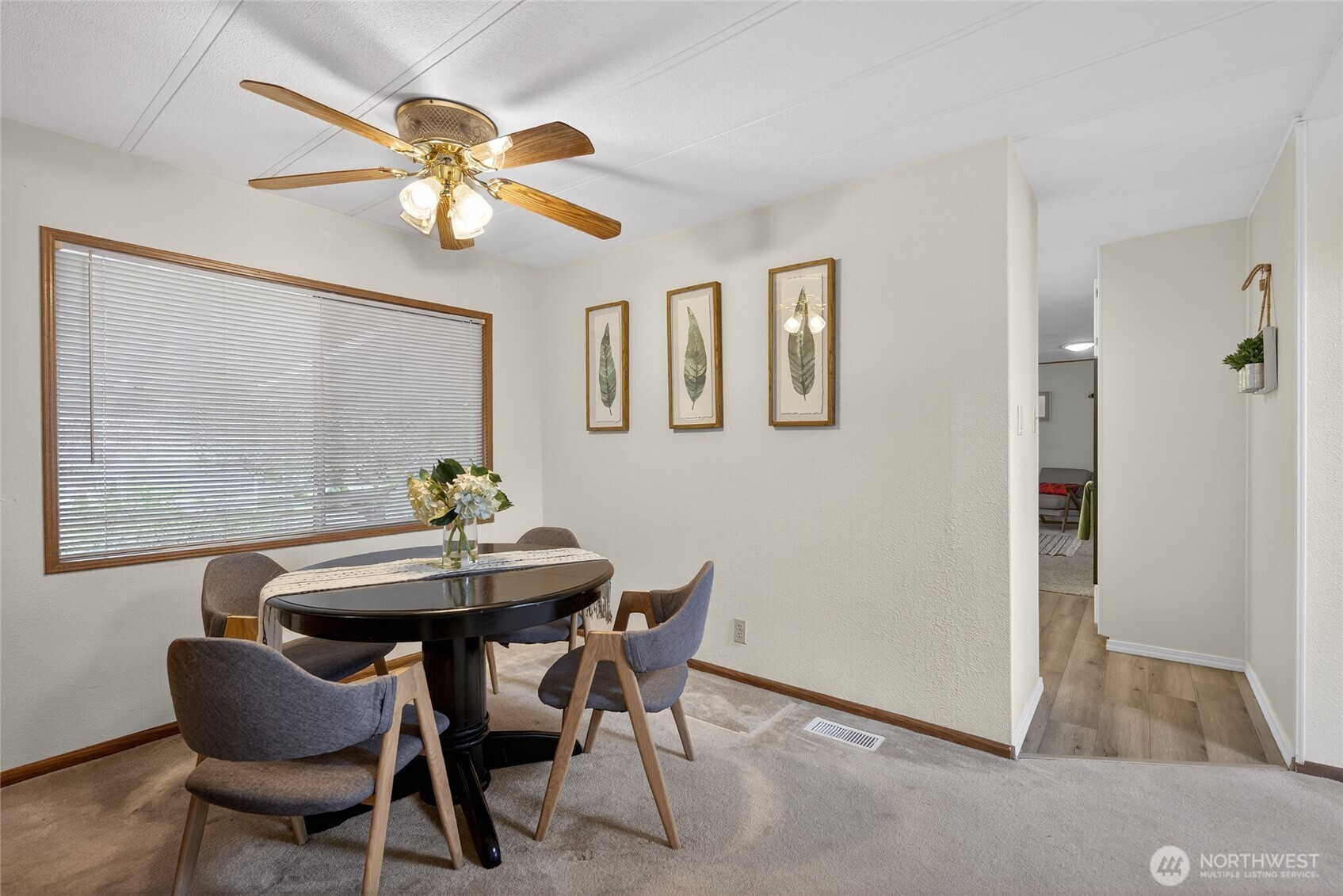 3323 207th Place Southeast Bothell, WA 98012 - Photo 11 of 33 a view of a dining room with furniture and chandelier