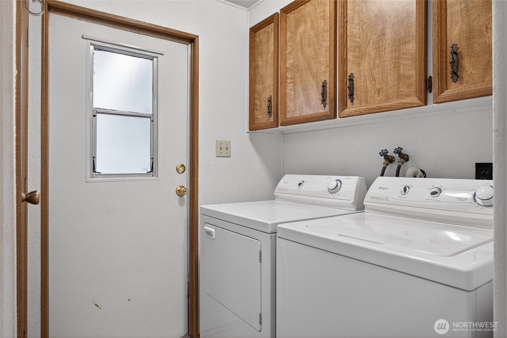 3323 207th Place Southeast Bothell, WA 98012 - Photo 16 of 33 a utility room with dryer and washer