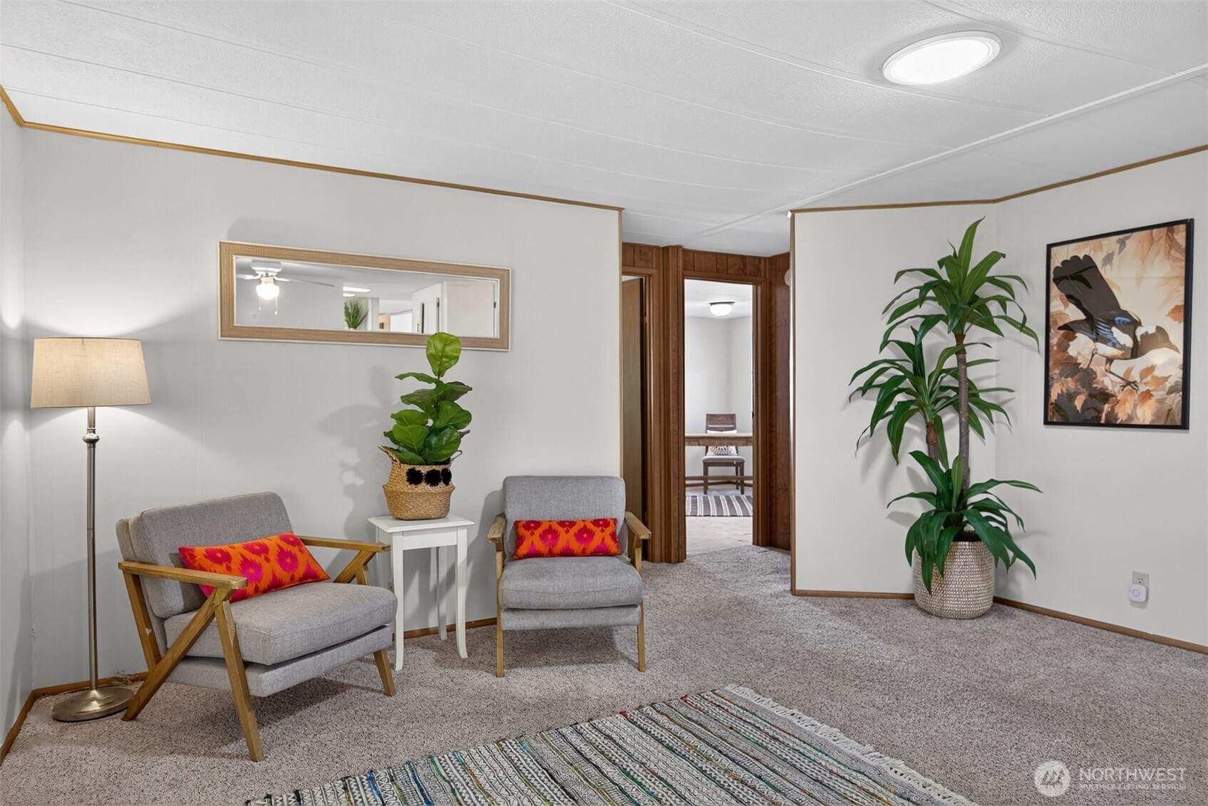 3323 207th Place Southeast Bothell, WA 98012 - Photo 20 of 33 a living room with furniture and a potted plant