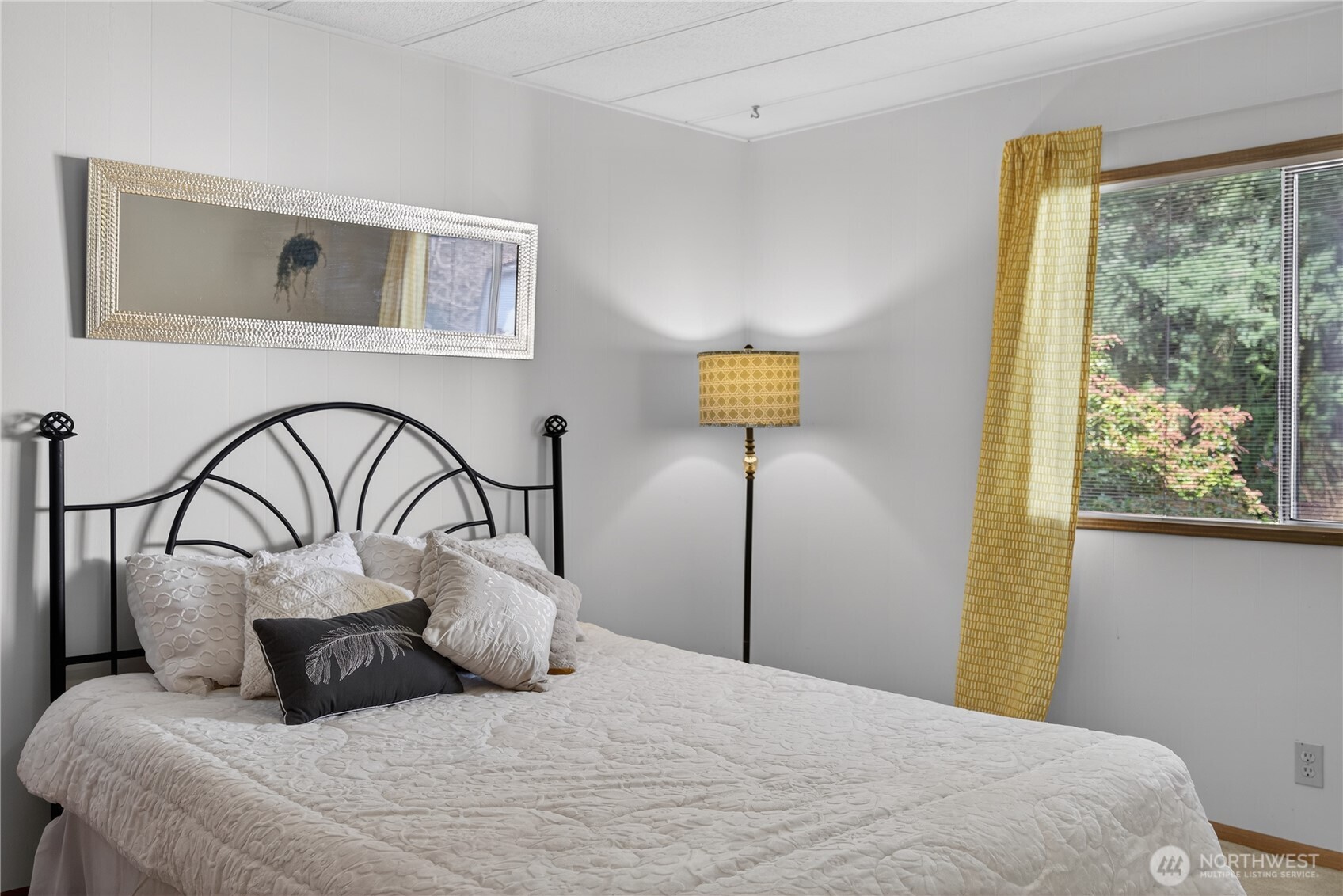 3323 207th Place Southeast Bothell, WA 98012 - Photo 25 of 33 a bedroom with a bed and wooden floor