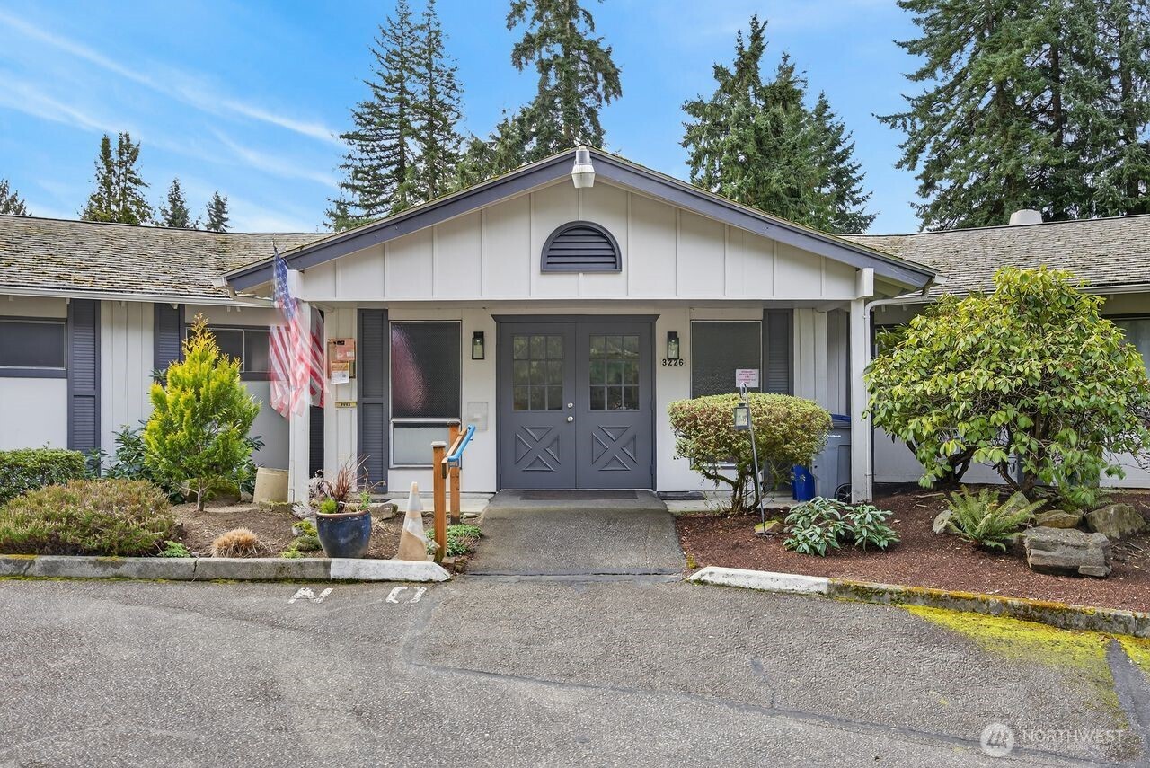 3323 207th Place Southeast Bothell, WA 98012 - Photo 26 of 33 a front view of a house with garden