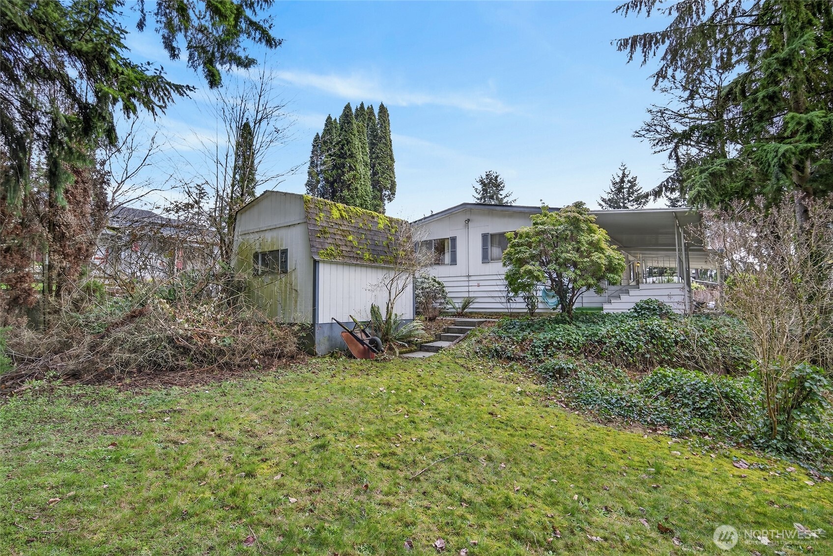3323 207th Place Southeast Bothell, WA 98012 - Photo 5 of 33 a view of a house with a yard and potted plants