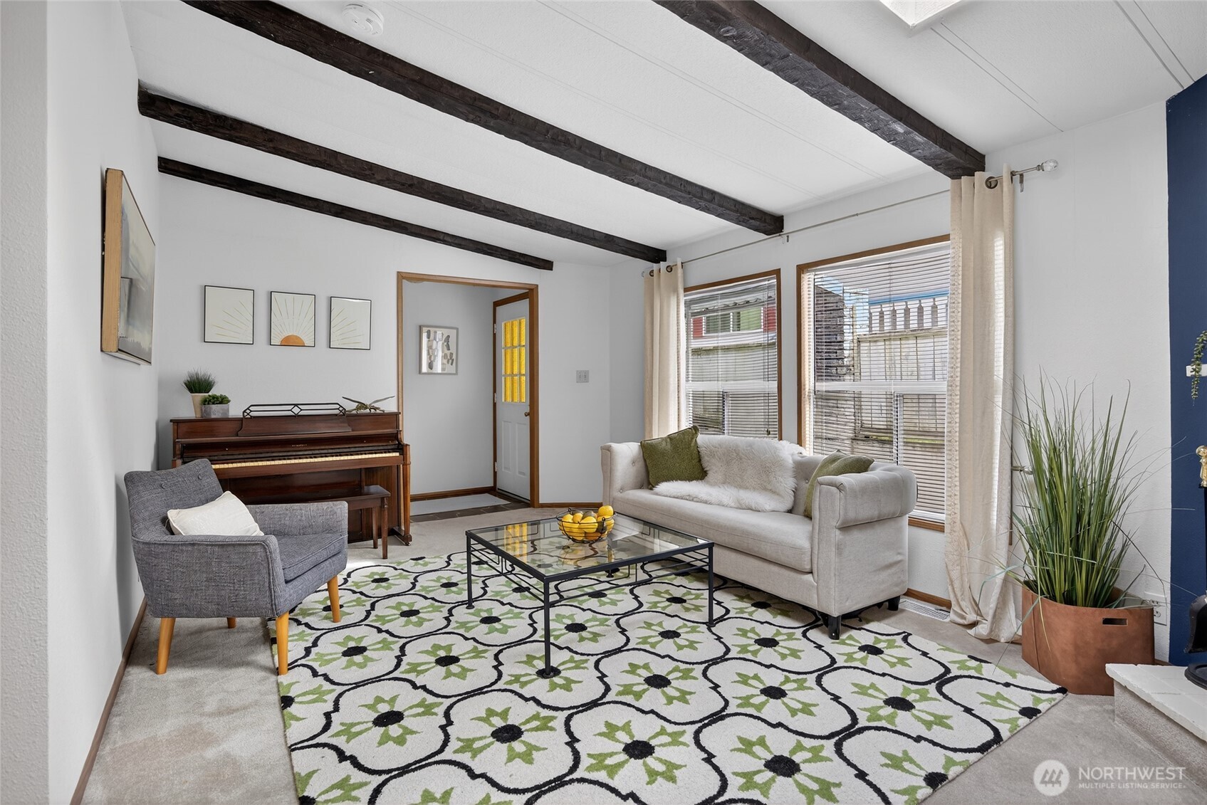 3323 207th Place Southeast Bothell, WA 98012 - Photo 7 of 33 a living room with furniture and a window