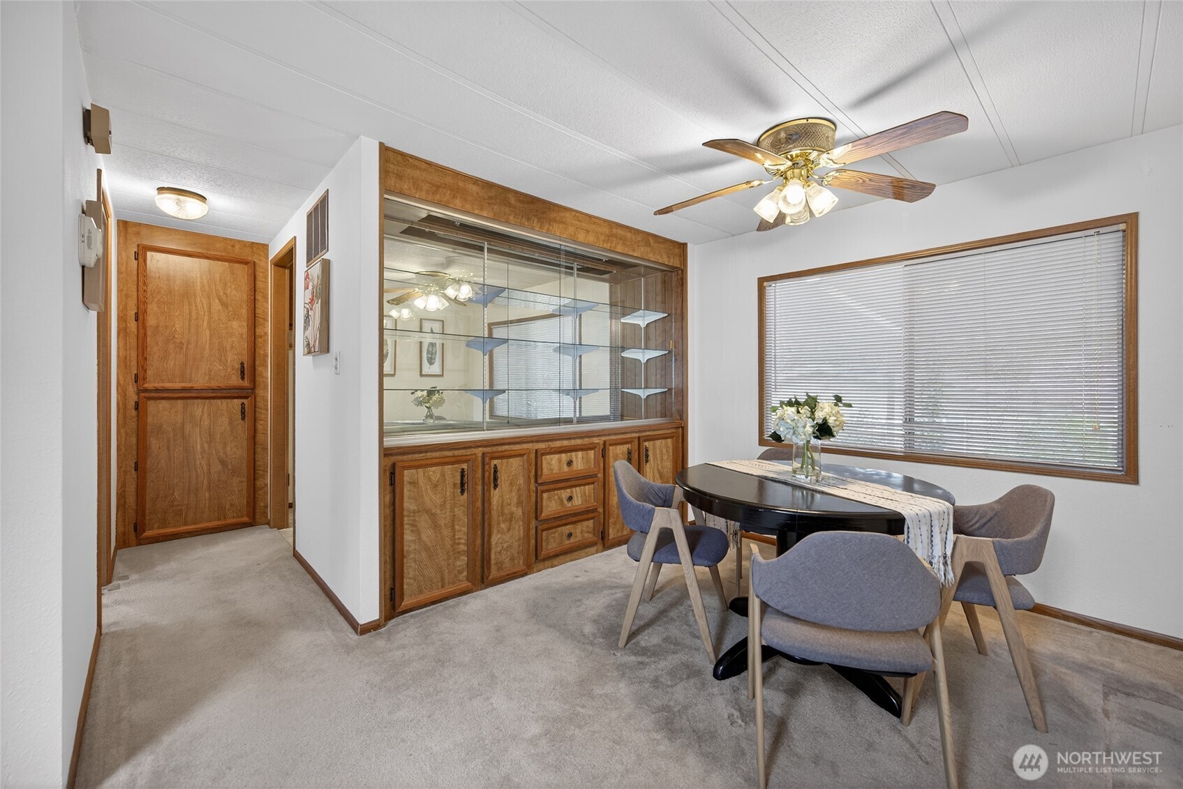 3323 207th Place Southeast Bothell, WA 98012 - Photo 10 of 33 a view of a dining room with furniture and window