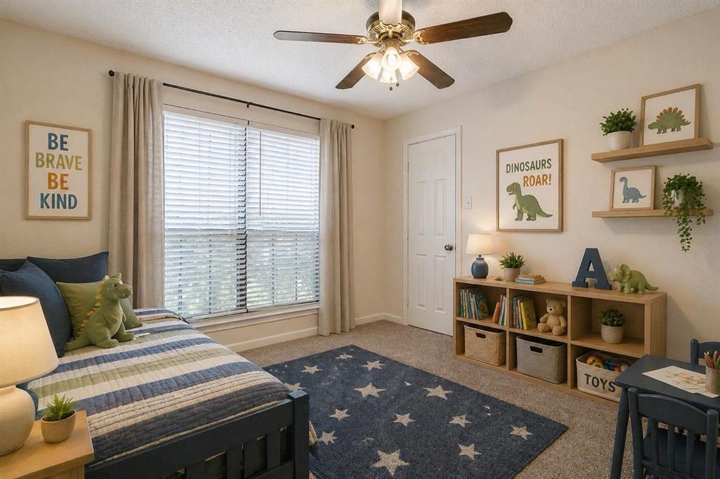 8613 Silver Creek Road White Settlement, TX 76108 - Photo 23 of 40 a living room with furniture and a bookshelf