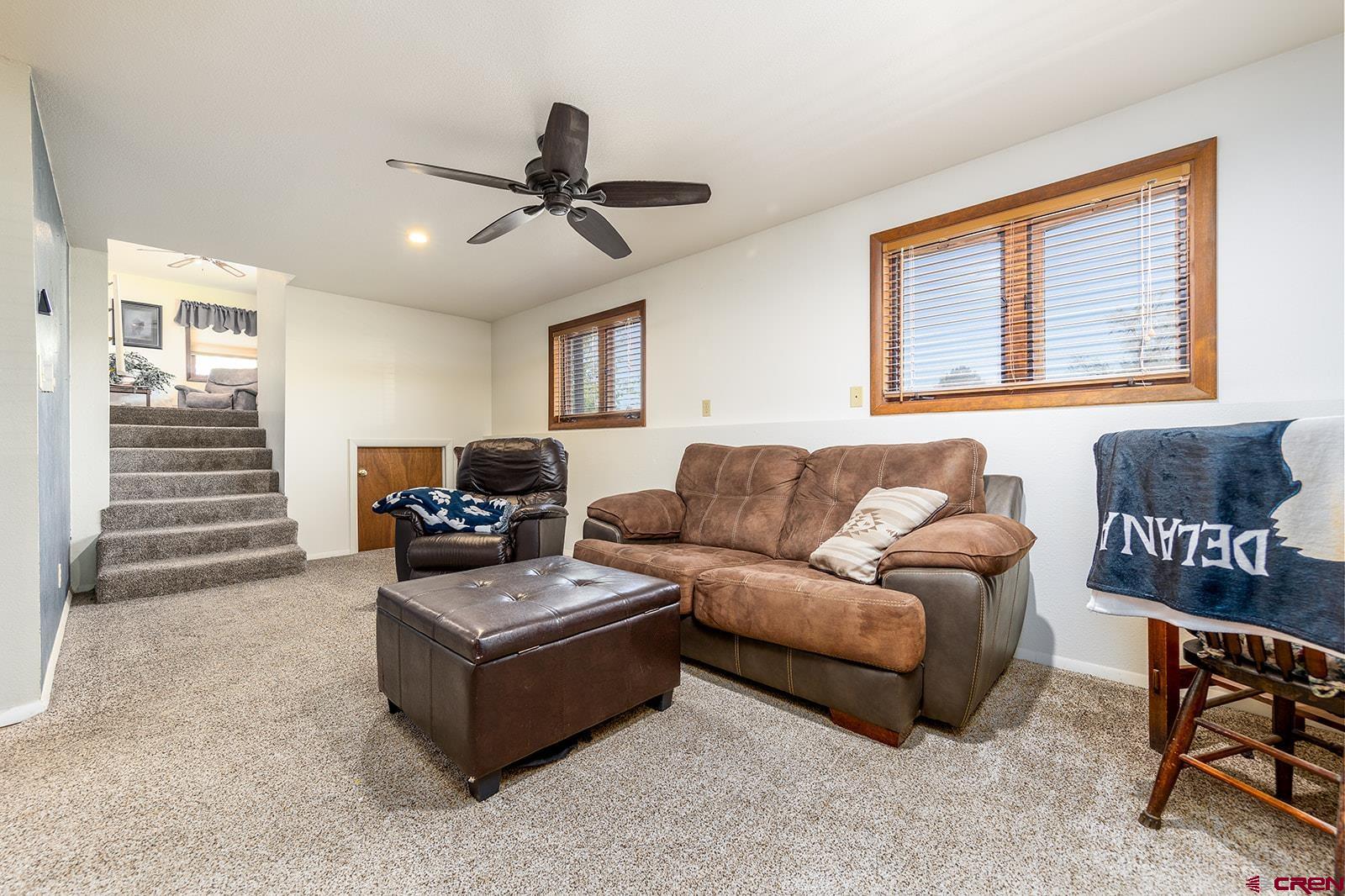 9467 6097 Road Montrose, CO 81401 - Photo 14 of 34 a living room with furniture and a window
