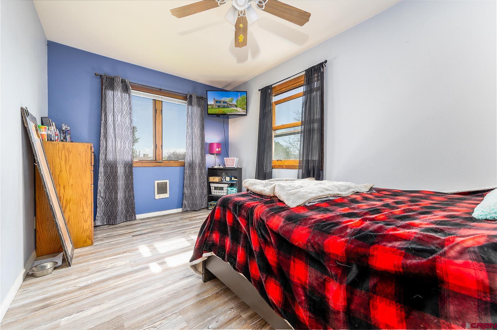 9467 6097 Road Montrose, CO 81401 - Photo 22 of 34 a bedroom with a bed and a window