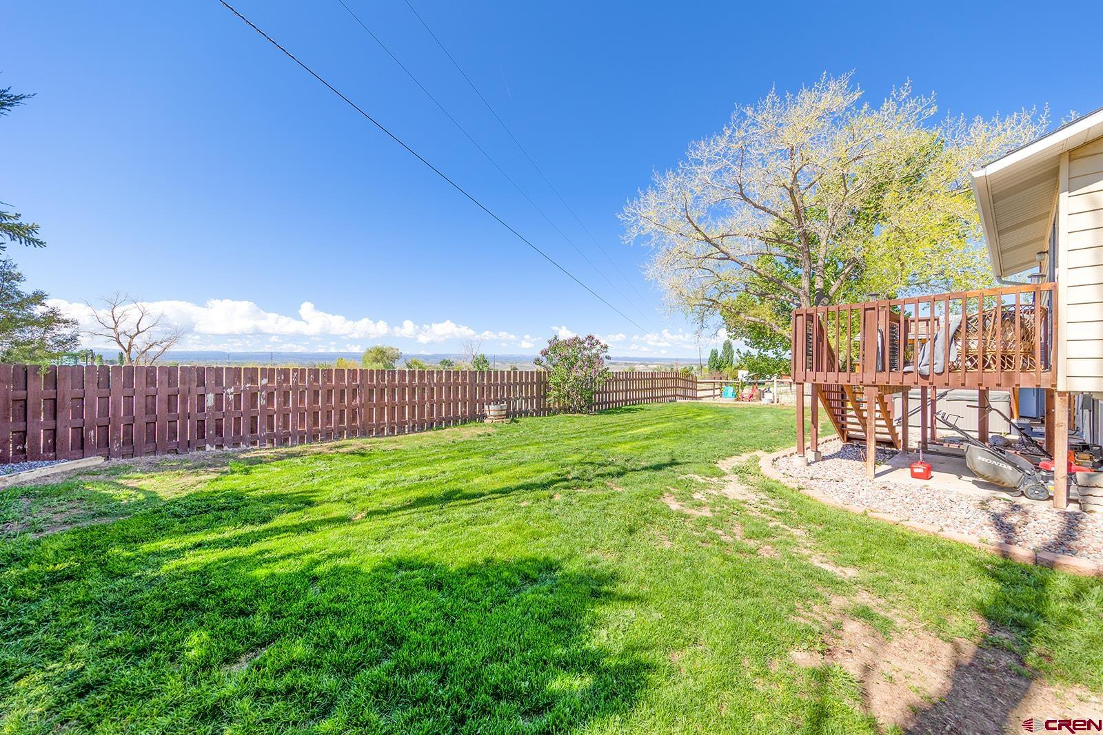9467 6097 Road Montrose, CO 81401 - Photo 27 of 34 a view of a chair and table on the garden