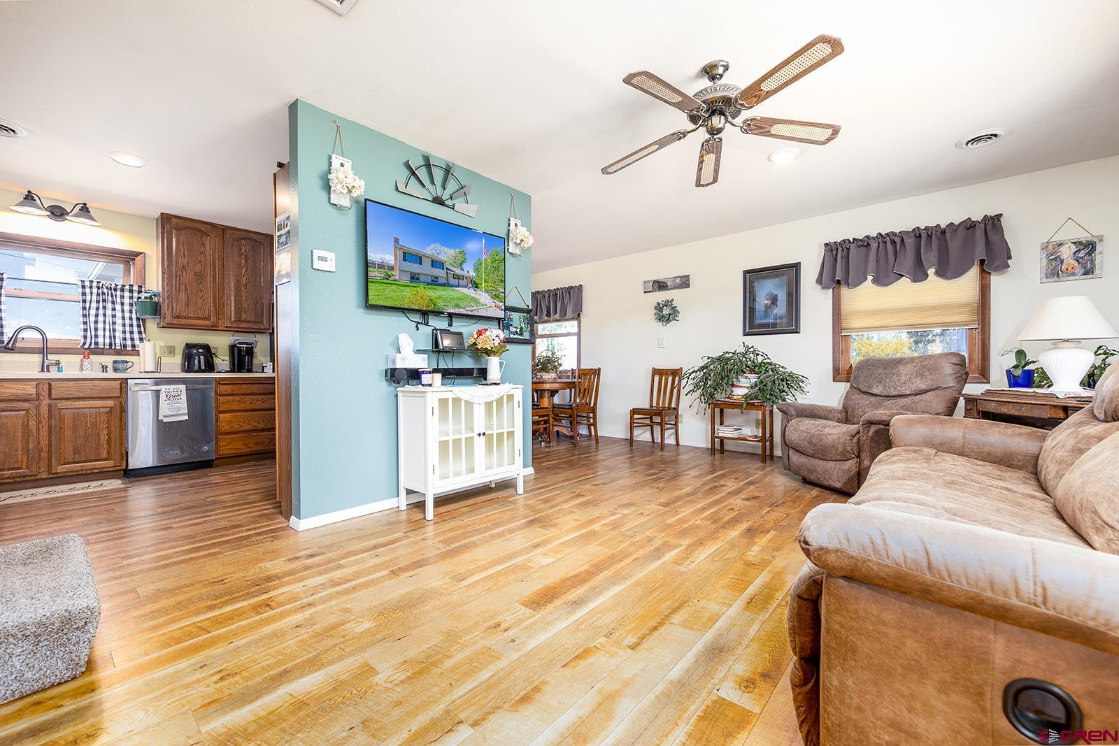 9467 6097 Road Montrose, CO 81401 - Photo 3 of 34 a living room with furniture and kitchen view