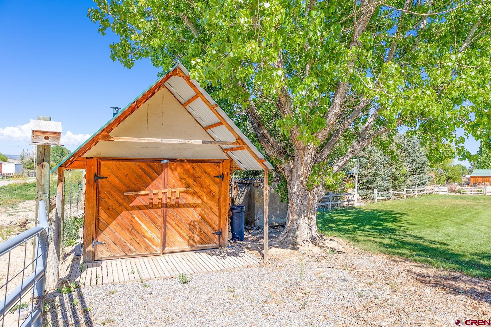 9467 6097 Road Montrose, CO 81401 - Photo 34 of 34 a view of swimming pool with a backyard