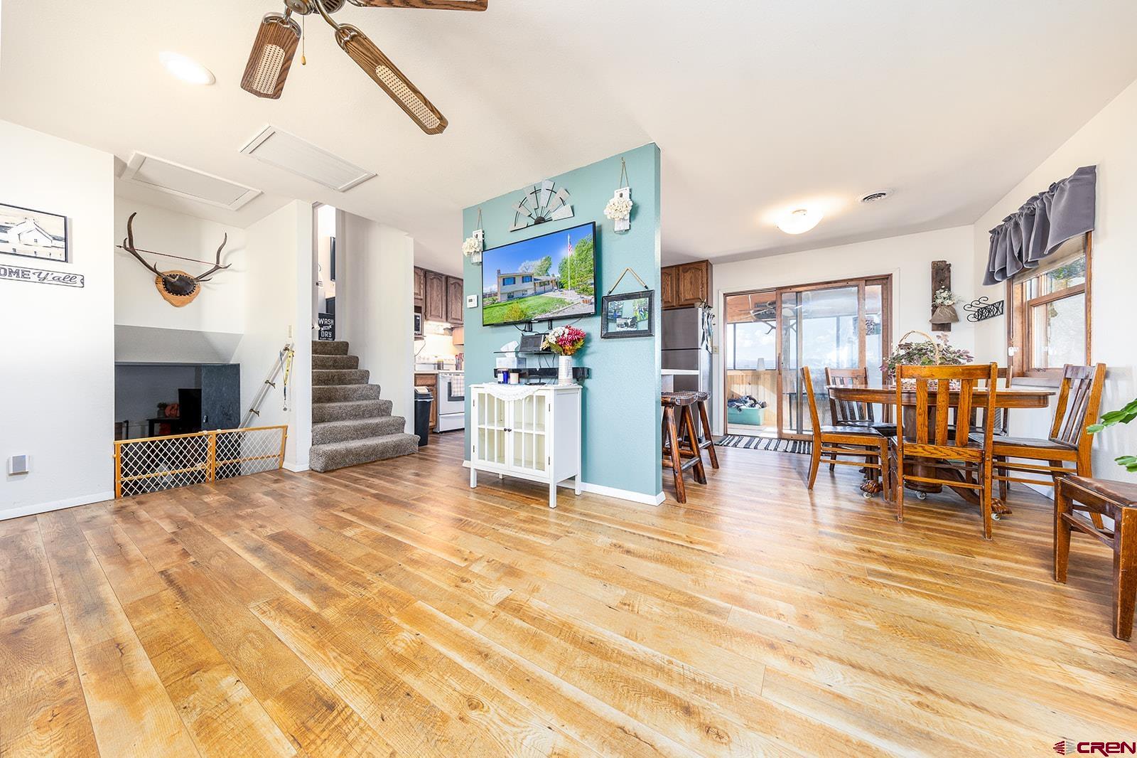 9467 6097 Road Montrose, CO 81401 - Photo 4 of 34 a view of kitchen with furniture and wooden floor