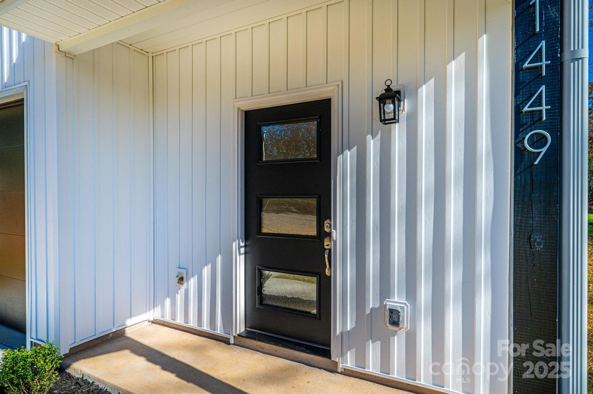 1449 4th Street Southwest Hickory, NC 28602 - Photo 17 of 19 a bedroom with a bed and a window