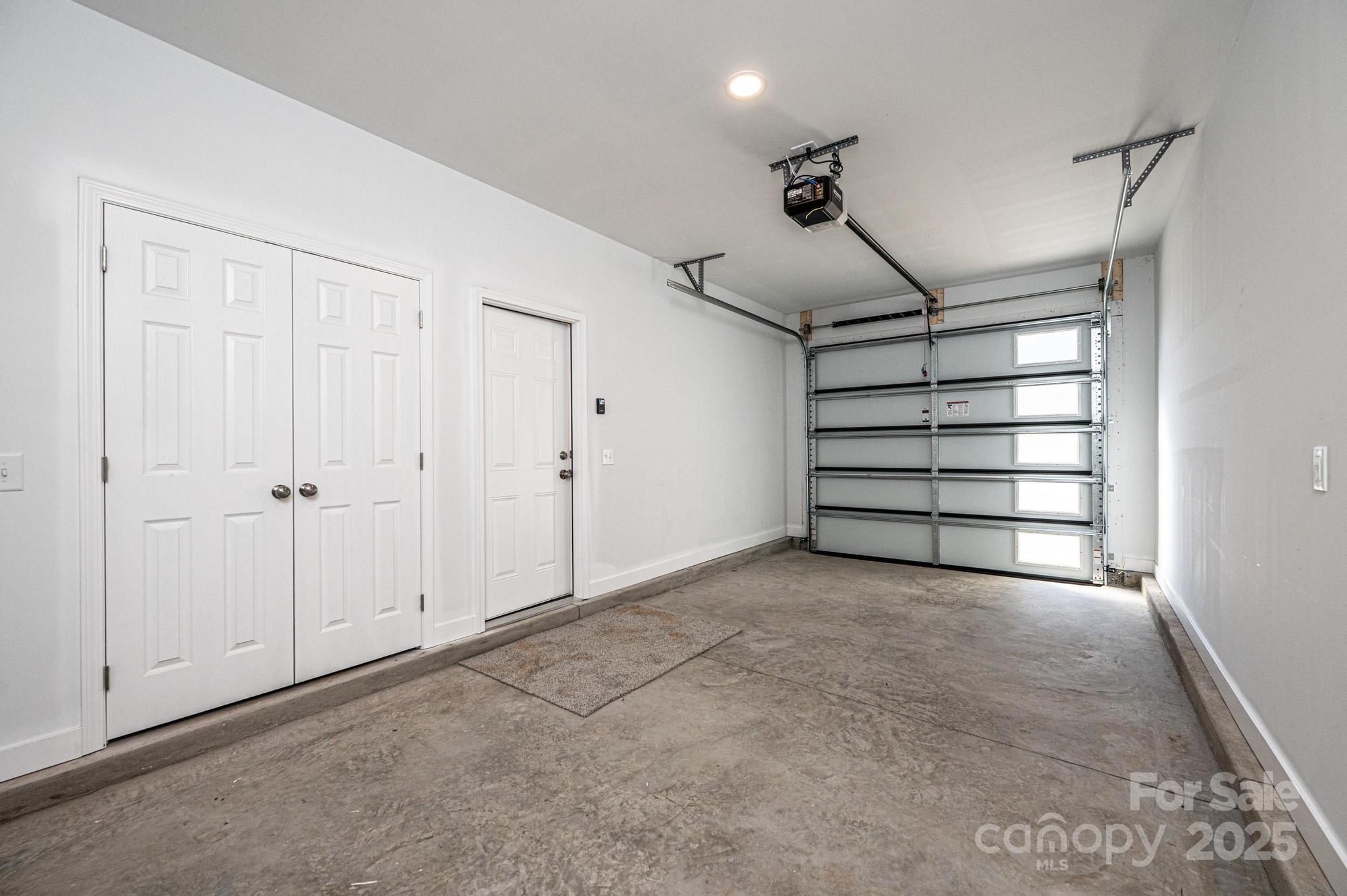 1449 4th Street Southwest Hickory, NC 28602 - Photo 18 of 19 a view of an empty room with a windows