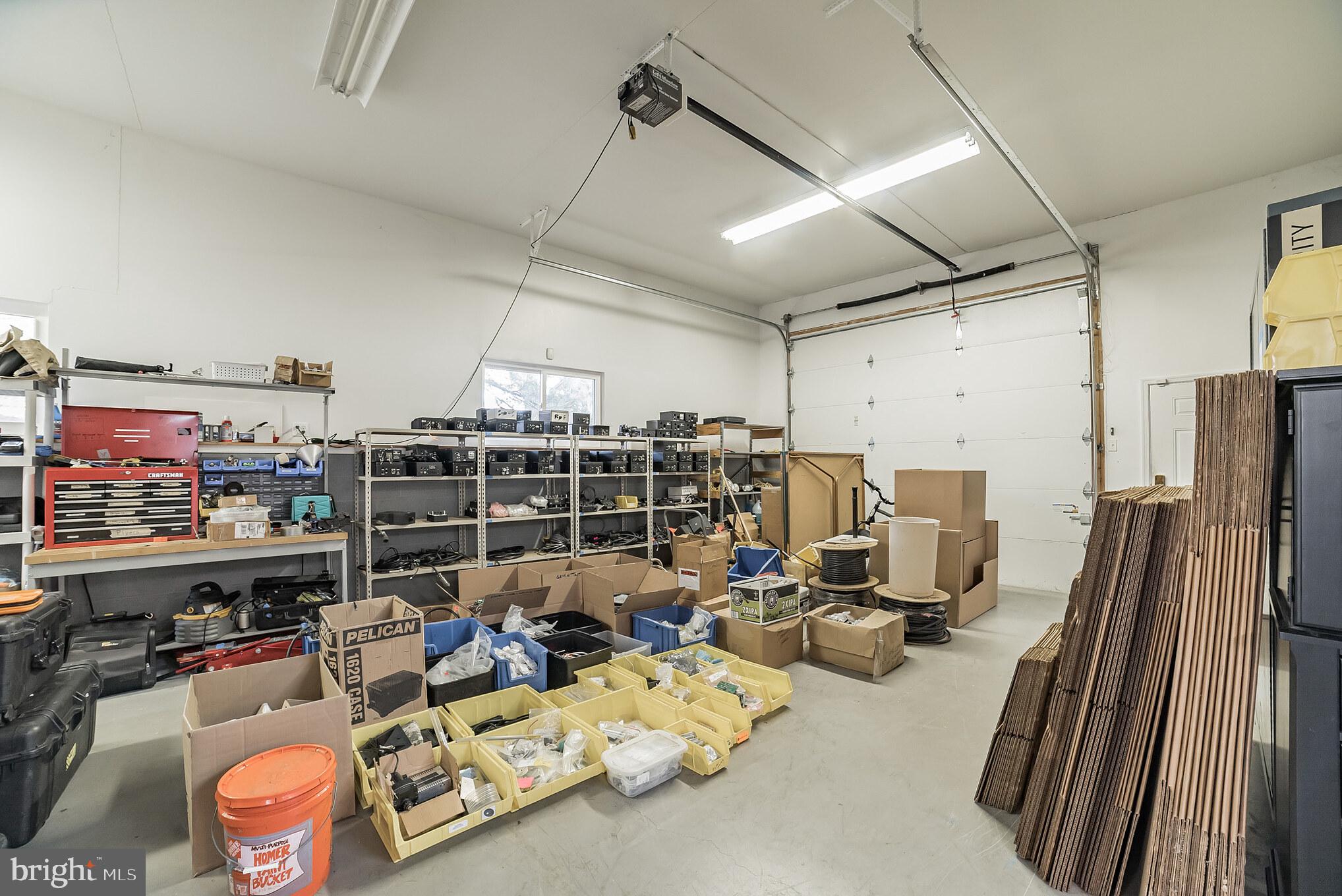 4757 Buffalo Road Mount Airy, MD 21771 - Photo 44 of 50 a storage room with lots of furniture and clutter