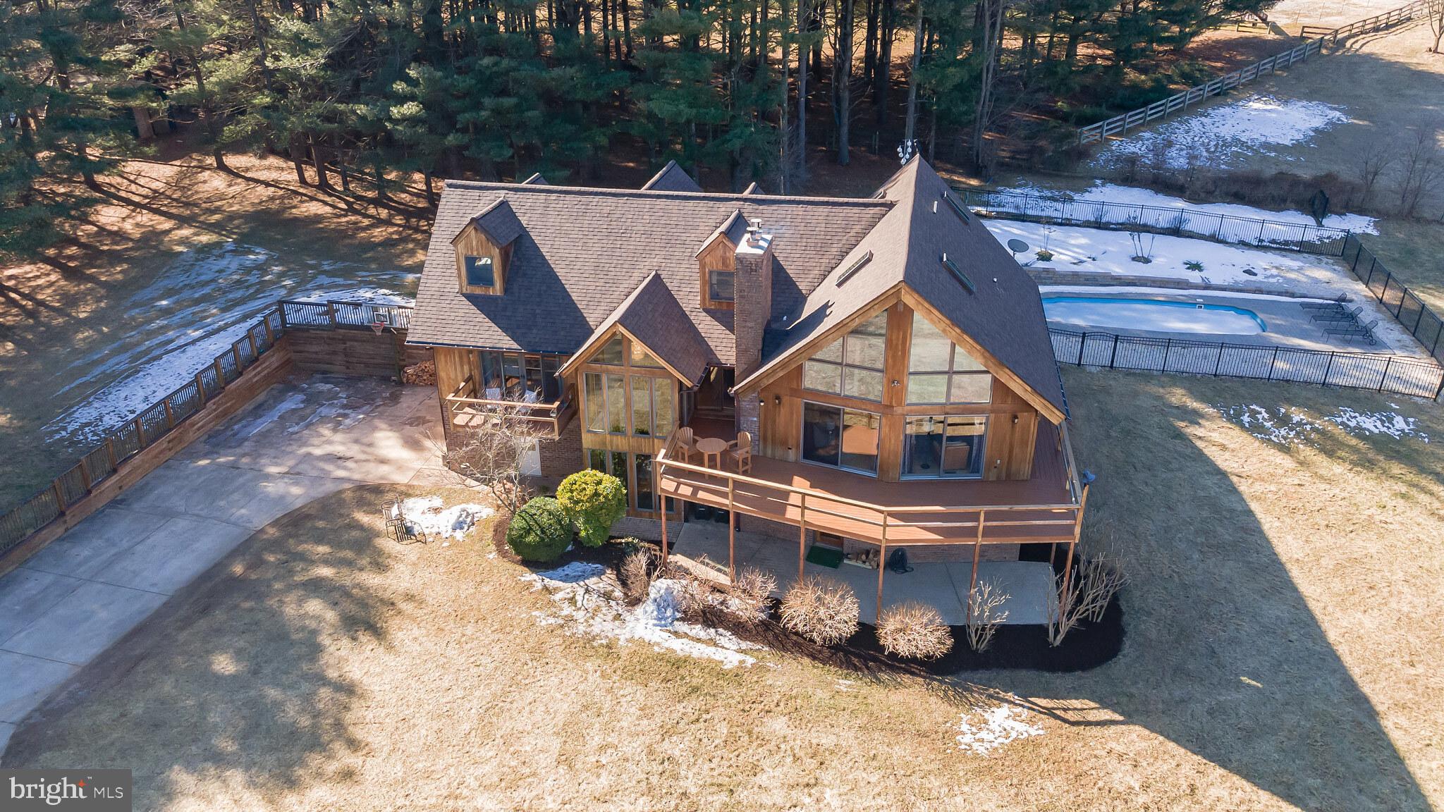 4757 Buffalo Road Mount Airy, MD 21771 - Photo 49 of 50 a aerial view of a house with roof deck front of house