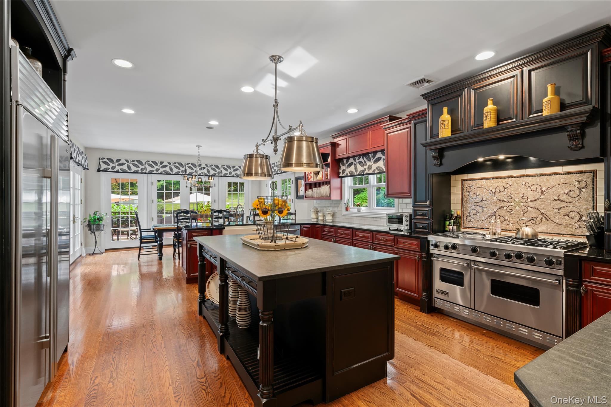12 Parish Drive Locust Valley, NY 11560 - Photo 12 of 49 a kitchen with a stove and cabinets