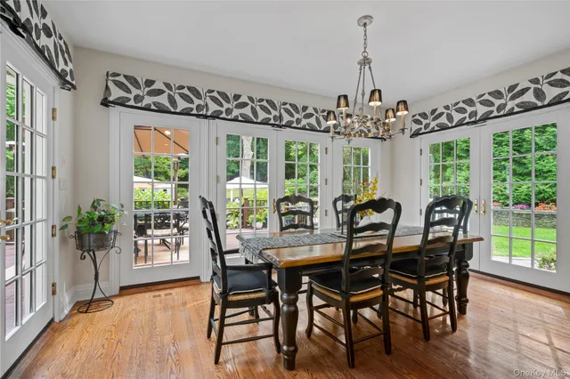 a bathroom with double sink and a mirror