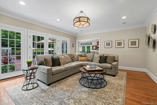 a living room with furniture and a table