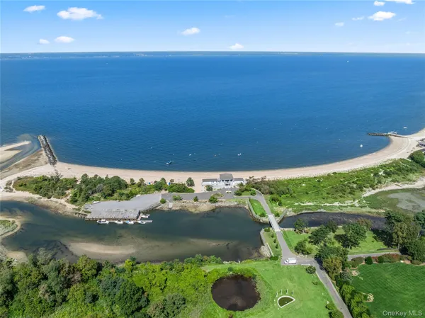 a view of a lake with a yard
