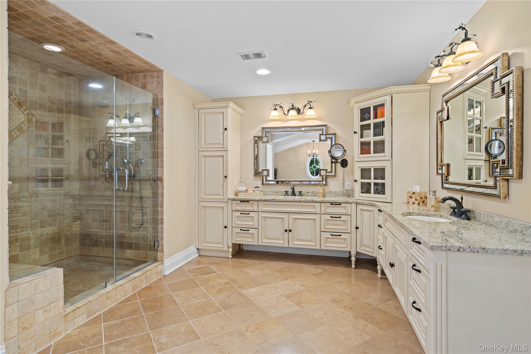 12 Parish Drive Locust Valley, NY 11560 - Photo 28 of 49 a bathroom with a granite countertop sink mirror and shower