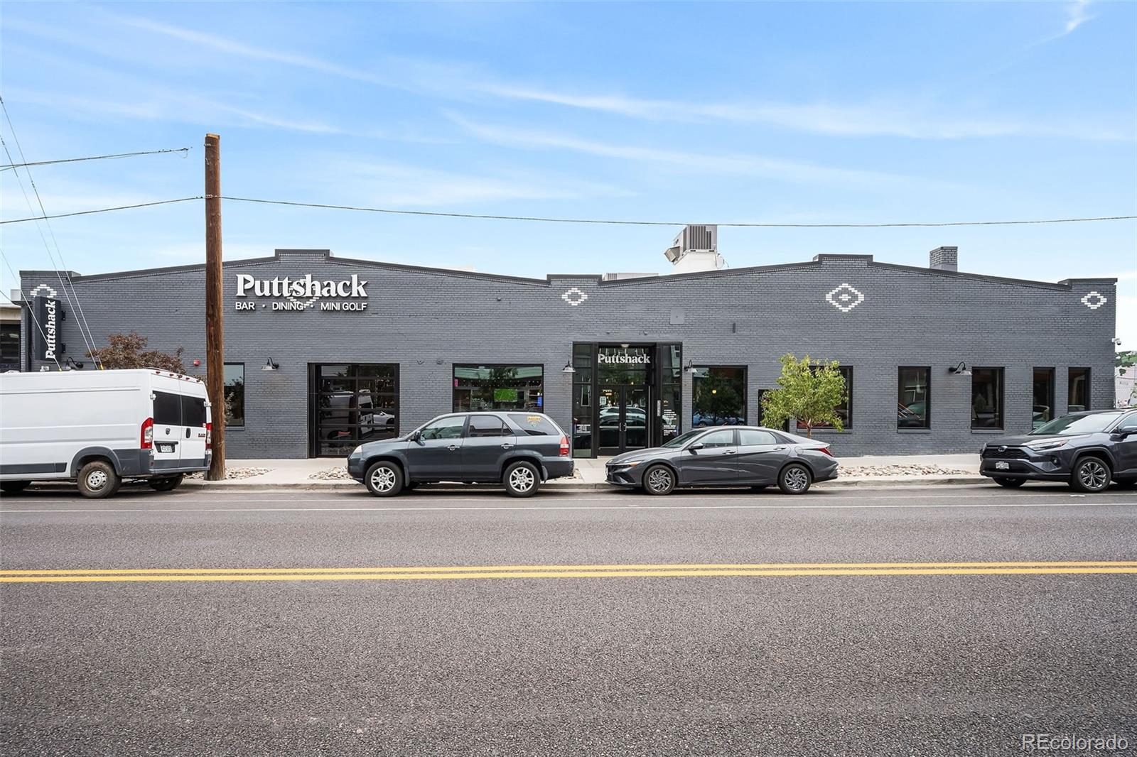 2500 Walnut Street, Unit 201 Denver, CO 80205 - Photo 25 of 30 a view of a cars park in front of a building