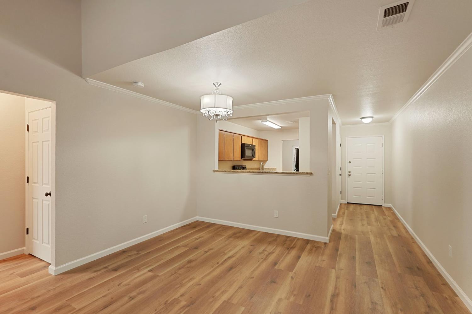 2400 Eilers Lane, Unit 1806 Lodi, CA 95242 - Photo 14 of 29 a view of a big room with wooden floor and windows