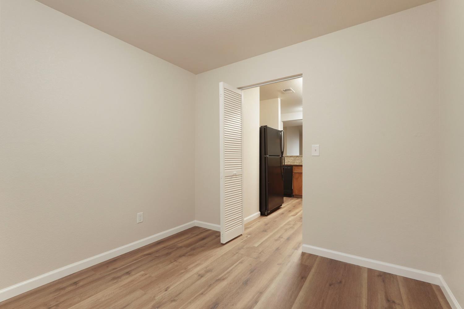 2400 Eilers Lane, Unit 1806 Lodi, CA 95242 - Photo 17 of 29 a view of a small space with wooden floor and a sink