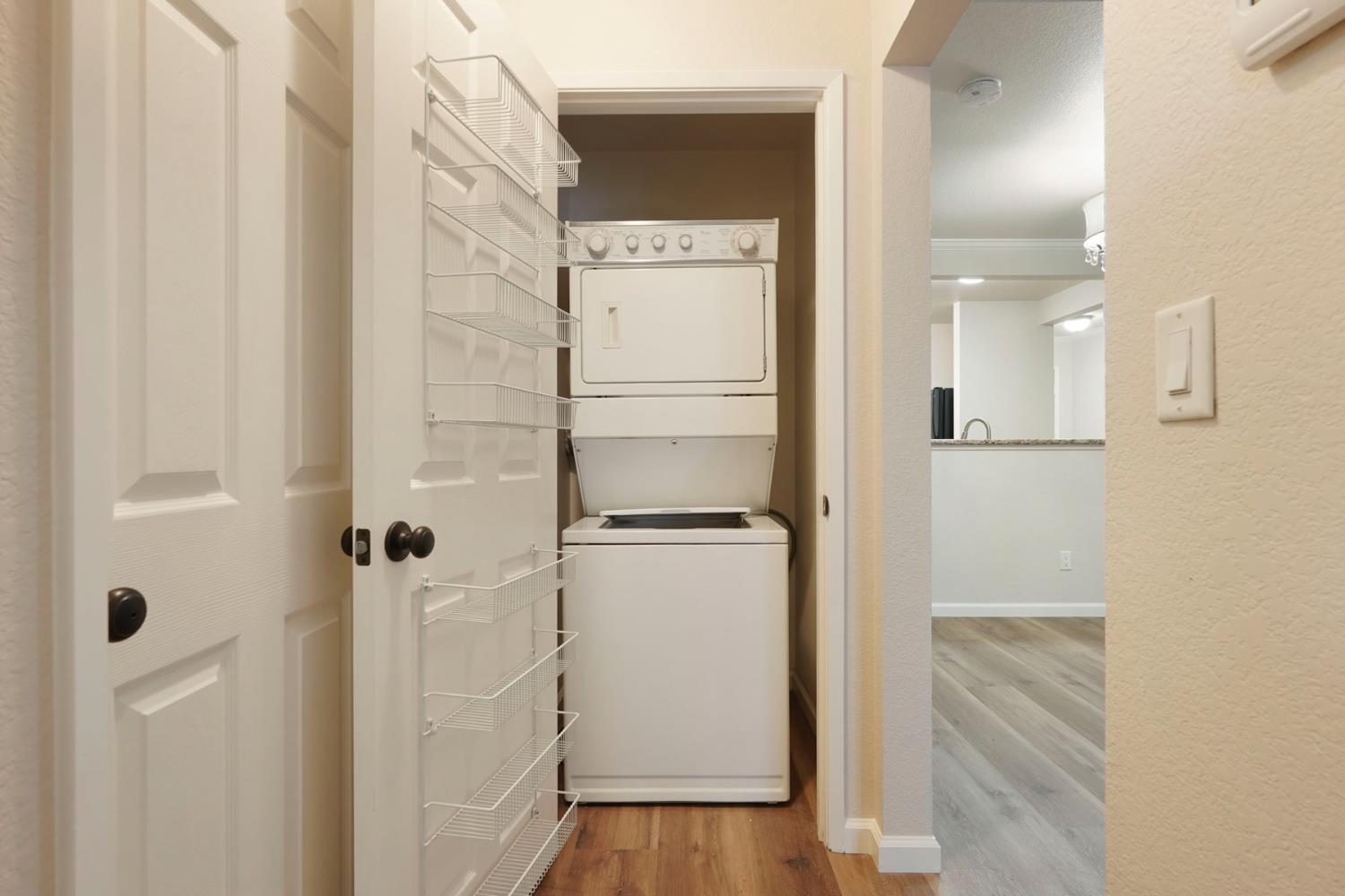 2400 Eilers Lane, Unit 1806 Lodi, CA 95242 - Photo 25 of 29 a bathroom with a walk in closet and wooden floor