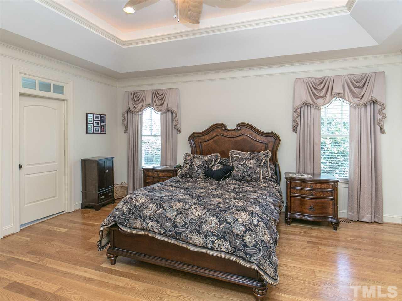 12609 Port Chester Court Raleigh, NC 27614 - Photo 11 of 23 Convenient 1st Floor Master with Hardwood Floors, Trey Ceiling and Access to Deck